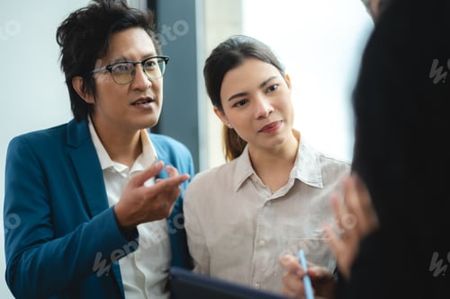 Business Colleagues Having a Discussion at Work