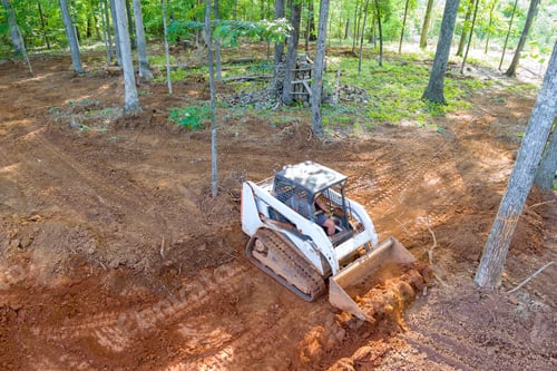 Preview: Use of tractor in construction enablese movement heavy earth materials, making it easier to level
