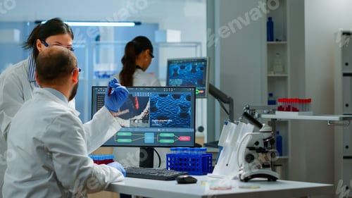 Preview: Group of scientists working in modern equipped laboratory pointing on computer