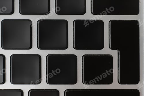 Preview: macro shot of empty blank keys on a keyboard without letter