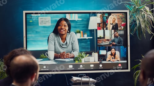 Preview: Project management team attending videocall meeting with shareholders