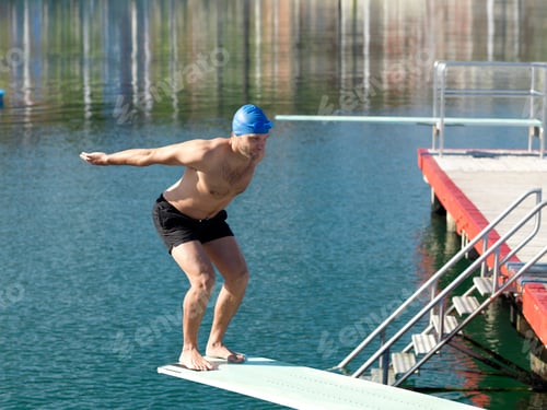 Preview: Swimmer diving from boardwalk, Eastern Beach, Geelong, Victoria, Australia