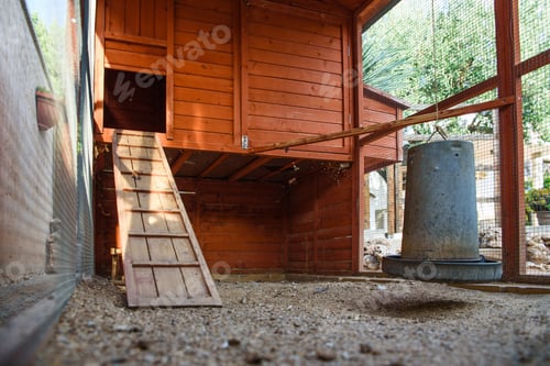 Preview: Interior of a dirty empty chicken coop.
