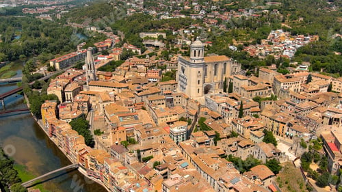 Preview: Aerial view of Girona and Church of Sant Feliu and Saint Mary Cathedral in a beautiful summer day