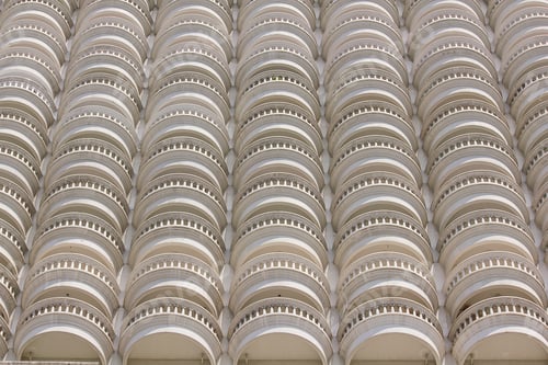 Preview: The curved white building balcony