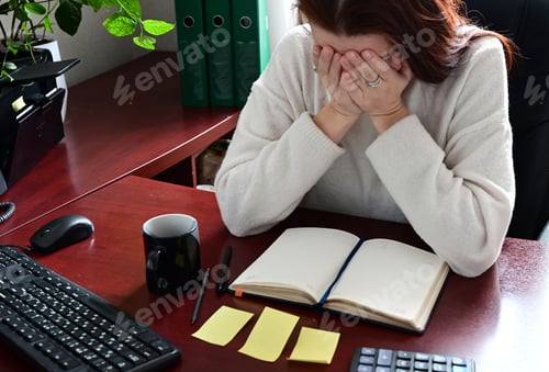 Preview: a woman works at a computer in an office, solving economic problems, working space,