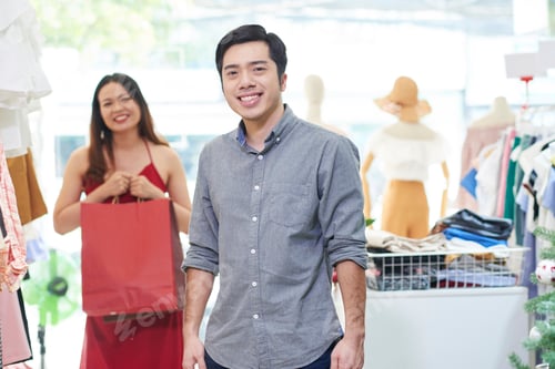 Preview: Cheerful man in department store