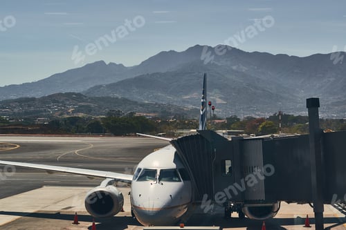 Preview: Beautiful shot of an airplane parked near the gate