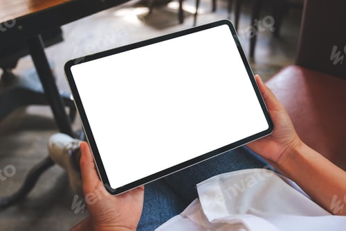 Preview: Top view mockup image of a woman holding digital tablet with blank white desktop screen