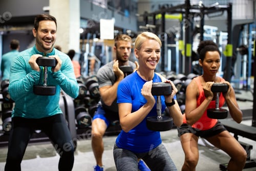Preview: Group of sportive people in gym. Happy fit friends workout, exercise in fitness club