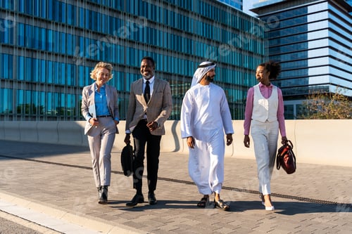 Preview: Group of multiethnic business people meeting an emirati businessman