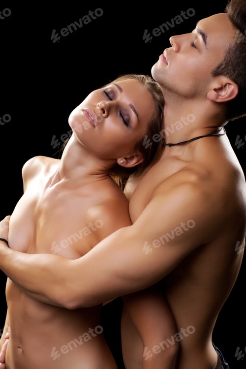 Preview: Young Couple In Love On Black Background