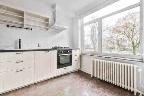 Preview: The interior of a stylish kitchen with a window