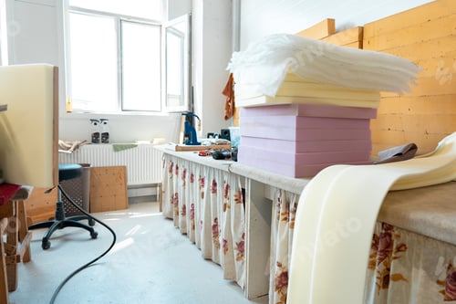 Preview: Stacked sheets of foam rubber for furniture production in factory workshop