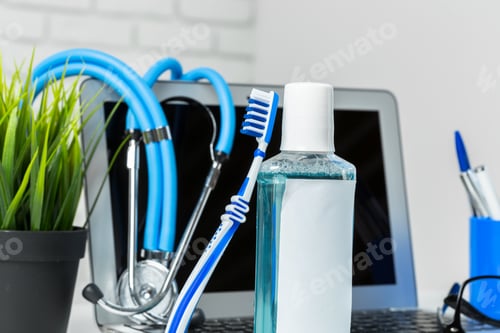 Preview: Toothbrushes on the table on light background