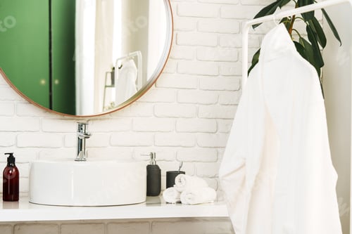 Preview: Mirror and towels in the bathroom close up
