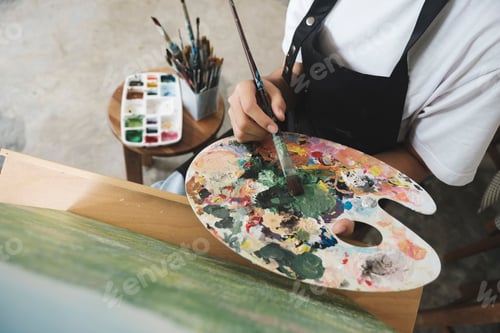 Preview: Crafting Inspiration: Female Artist Sketching and Painting in Workshop