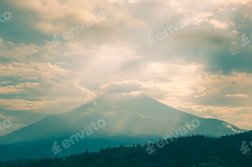 Preview: Mountain with dramatic sky and sunlight