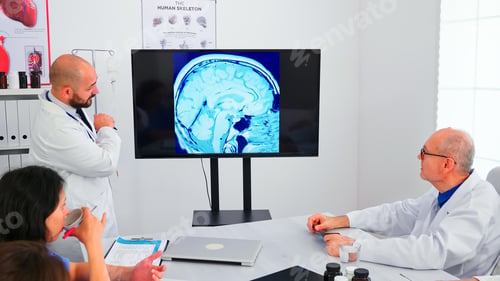 Preview: Expert doctor using modern technology during medical conference