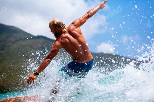 Preview: man surfing actively