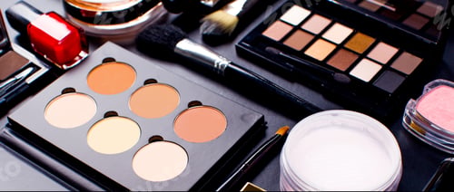 Preview: Cosmetics on dark background, closeup