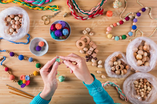 Preview: Hobby, crafting, creativity, time at home. Hands making baby beads