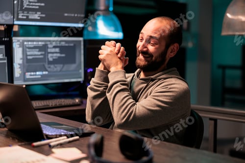 Preview: App developer feeling happy about coding victory