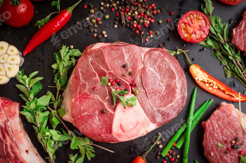 Preview: Raw veal shank on a dark background ready to roasting