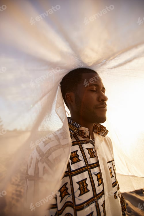 Preview: Black man covered with veil