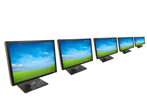 Preview: Computer Monitors Displaying Green Field and Blue Sky