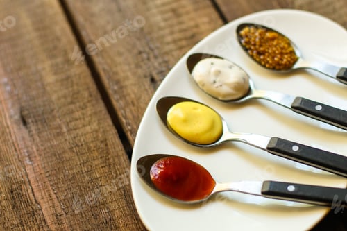 Preview: Sauces In Portioned Cutlery, Serving Appetizer (Different Varieties) Menu Concept. Food Background