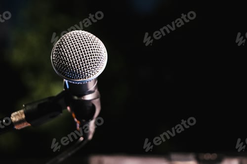 Preview: Closeup shot of a microphone on the stage