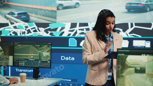 Preview: Indian manager and her team monitoring their delivery cars in traffic