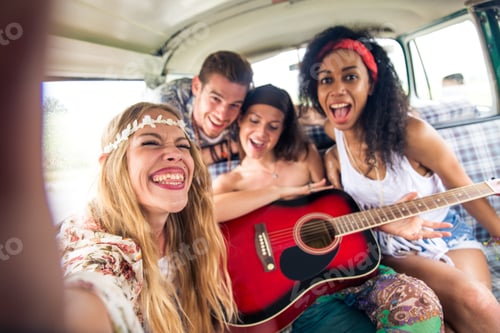 Preview: Happy friends driving a vintage minivan