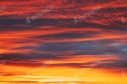Preview: Abstract Saturated Orange-yellow Colors Of Clouds. Unusual Sky Background. Rich Orange Colors. Toned