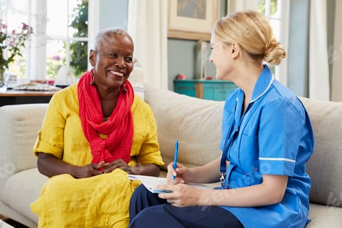 Preview: Female Community Nurse Visits Senior Woman At Home