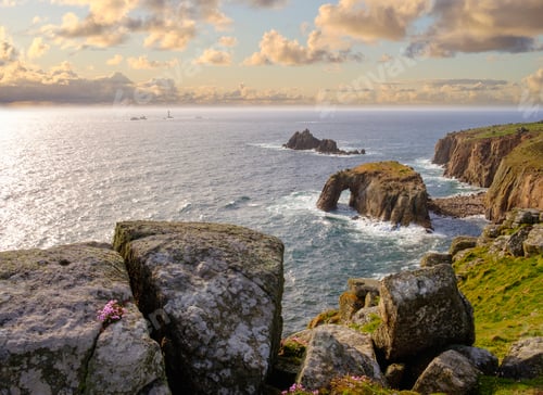 Preview: UK, England, Cornwall, Land's End, cliff coast with Enys Dodman Rock and Longships Lighthouse in bac