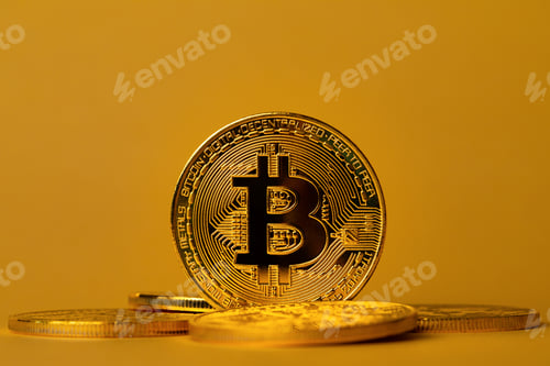Preview: Golden Bitcoin Coin Close Up on Gold Background