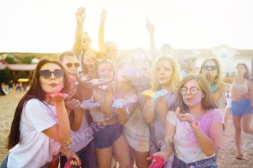 Preview: A group of friends have fun, dance at the holi festival. Spring Beach Party. Friendship, Leisure.