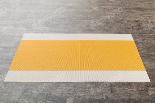Preview: Perspective view of yellow tablecloth for food on cement background. Empty space for your design