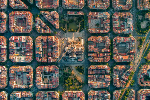 Preview: Aerial view of Barcelona Eixample residential district and Sagrada Familia Basilica at sunrise