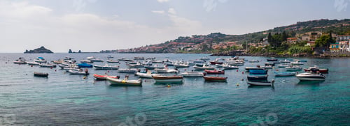 Preview: Panoramic photo of boats in the harbour at Aci Trezza with Isole dei Ciclope in the background, just