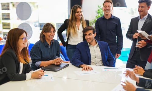 Preview: Multi generational people having business meeting inside modern office
