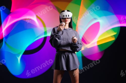 Preview: VR, AR, MR, XR Future technologies. Neon. young girl in VR glasses in neon plays a game