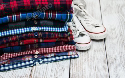 Preview: Stack of Plaid Shirts with White Sneakers