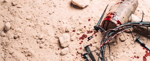 Preview: Old wooden cross, hammer, bloody nails and crown of thorns on ground. Banner. Copy space. Good