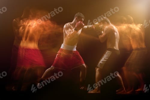Preview: The Two Male Boxers Boxing In A Dark Studio