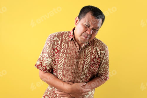 Preview: Portrait of Asian Middle Age Man, Hand in Stomach, Suffering Stomach Ache