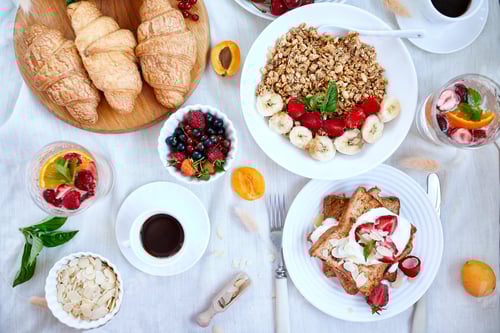 Preview: Fresh and bright continental breakfast table, abundance healthy meal variety