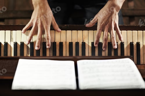 Preview: Artistic expression. Cropped high-angle view of a pianists hands.